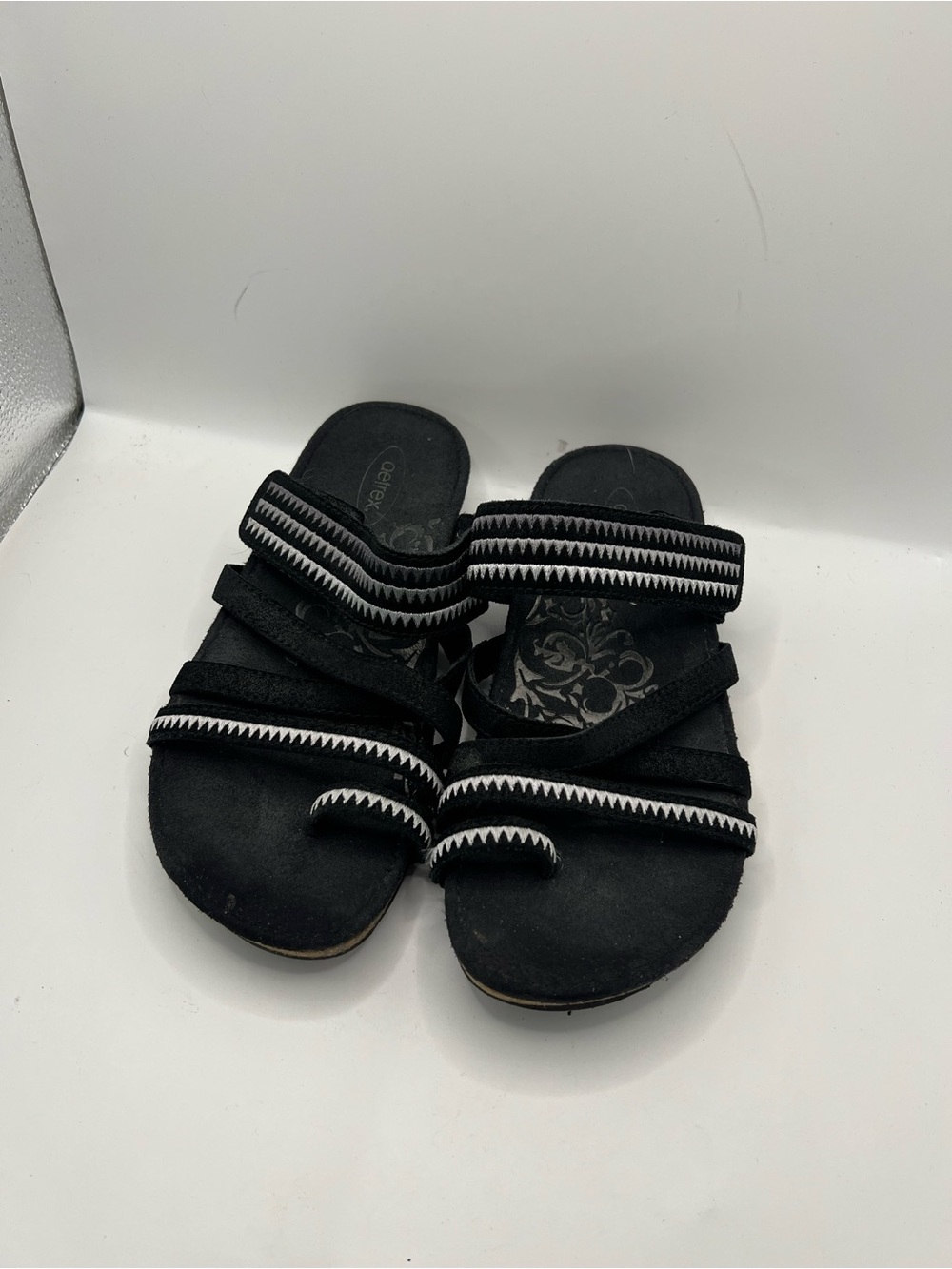 Aetrex Black Slip-On Sandals with White Zigzag Trim - Picture 1 of 10